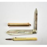 A 9ct engraved yellow gold propelling combination dip pen and pencil, a propelling bone cased