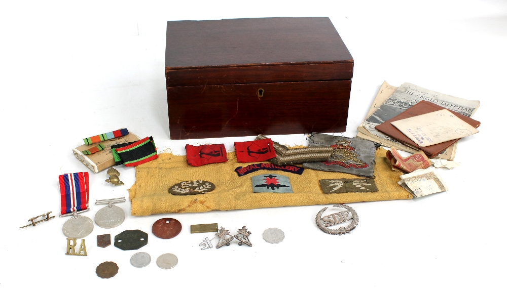 A small group of militaria and ephemera including WWII War and Defence medals, hallmarked silver
