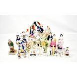 A group of Staffordshire figures and groups including 'Prince & Princess', pocket watch stand,