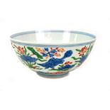 A 19th century Chinese porcelain Wucai circular bowl painted in underglaze blue with dragon