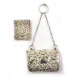 HENRY MATTHEWS; an Edward VII hallmarked silver rounded rectangular purse overall embossed with