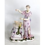 NIDERVILLER; a late 18th century French faience figure of a woman and a snake, painted marks to