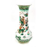 A late 19th century Chinese Famille Verte vase with everted rim, baluster body decorated with