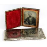 An unusual novelty cigarette case modelled as an American hundred dollar bill, length 17cm, also a