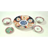 A Japanese Meiji period Imari charger, the central panel with floral decoration surrounded by