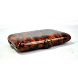 An early 20th century simulated tortoise shell travel vanity case of rectangular form, the hinged