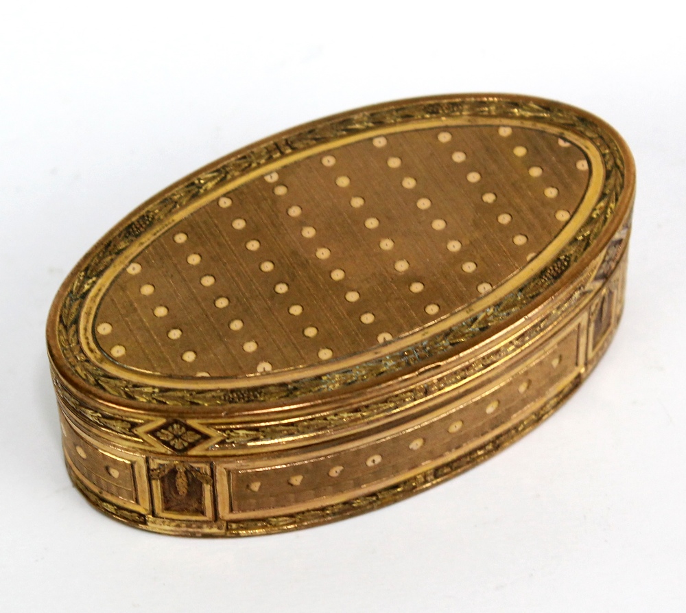 A 19th century French gilt metal snuff box of navette form, with detailed engraved decoration