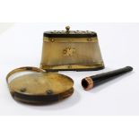 A horn mounted magnifying glass, a horn and brass snuff box with sliding open/close mechanism and