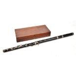 MONZANI & CO OF LONDON; an early 19th century rosewood flute no. 2102, stamped '28 Regent Street