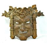 A cast brass wall mounted mask of Bacchus, 29 x 40cm.Additional InformationGeneral surface wear