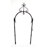 A black painted wrought iron garden arch, 182 x 84.5cm.