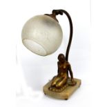 A period Art Deco gilt metal table lamp with original crackle glazed globular shade, angled arm