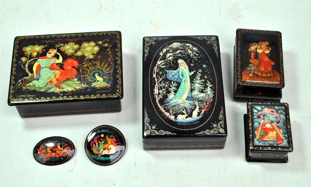 Four Russian lacquered boxes to include a large example painted with 'Princess Frog' scene by I