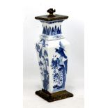 A 19th century Chinese porcelain vase of tapered form painted in underglaze blue with birds