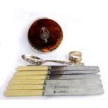 A small group of electroplated flatware including a set of six ivorine handled table knives, a