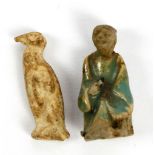 A miniature Chinese part glazed figure, height 2.7cm, and a further miniature figure of a bird,