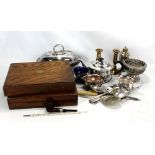 A small group of electroplated items to include a three piece tea set, a large sugar caster with