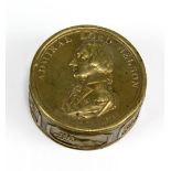 A brass circular commemorative box inscribed 'Admiral Lord Nelson born 29 Sept. 1758', diameter 5.