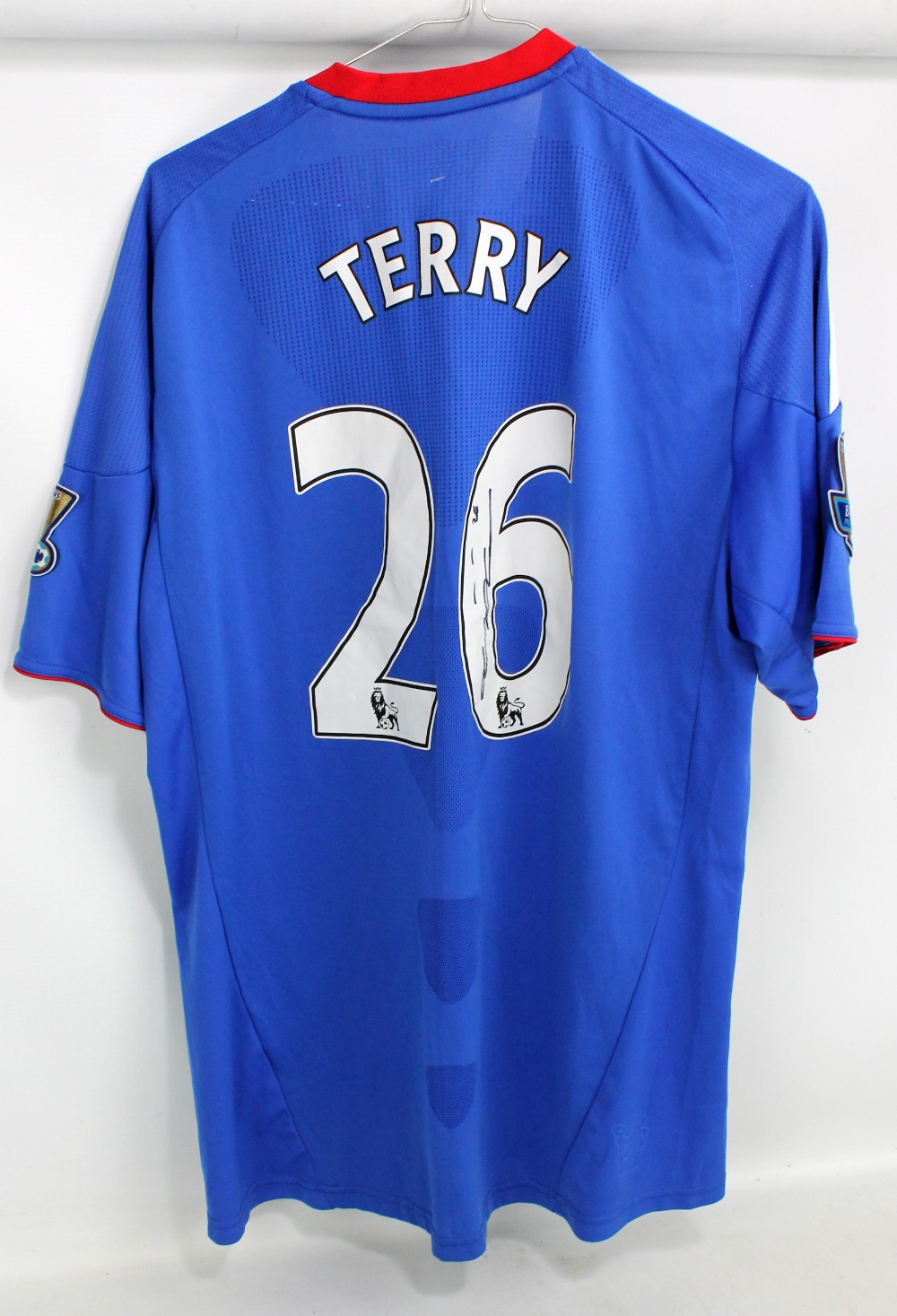 JOHN TERRY; a signed Chelsea replica home shirt, size UK L.