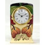 MOORCROFT; an 'Anna Lily' pattern tubeline decorated clock with impressed marks and year cipher