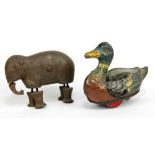 An American patent walking elephant toy, length 9cm, and a Hess-Roller 'Tippu-Tipp' duck, length