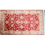 A red ground Ziegler carpet, 230 x 160cm.