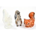 ROYAL COPENHAGEN; a figure of a squirrel, painted and printed marks to base, height 7cm, and a