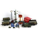 A group of early Hornby 0 gauge trains and accessories, including a 'Southern A179' engine and