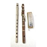 A rosewood fife with nickel keys, length 30.5cm, also a whistle by CH Mathieu of Paris and a boxed