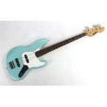 A Session Pro electric guitar in blue and white, length approx 99cm, in Freestyle case.