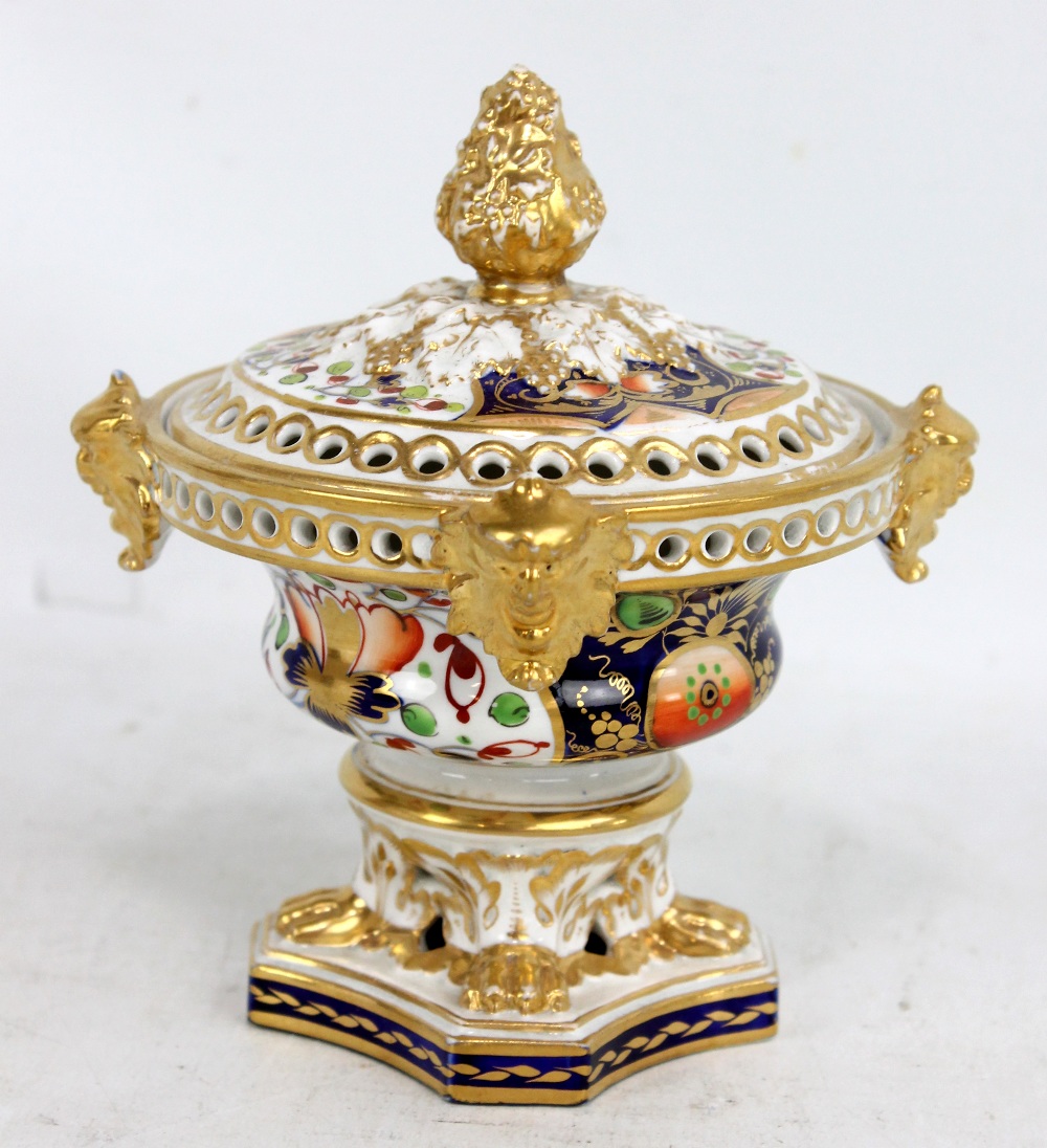 DERBY; a 19th century pot pourri bowl and cover, with gilt heightened finial above four applied
