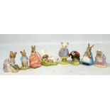 ROYAL ALBERT; eight Beatrix Potter figures including 'Benjamin Wakes Up', 'Johnny Town-Mouse', '