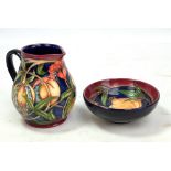 MOORCROFT; a 'Plevriana' pattern tubeline decorated jug, impressed marks and year cipher for 2004 to
