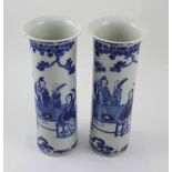 A pair of 19th century Chinese porcelain sleeve vases with blue and white figural decoration of