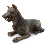 A 19th Century Sino-Tibetan shamanic carved dog, length approx 48cm.