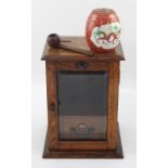 An Edward VII oak smoker's cabinet,