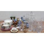 A collection of lead crystal to include three assorted decanters, one with enamelled brandy label,