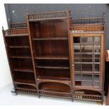 A good late 19th century Aesthetics period rosewood triple bookcase,