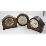 Two c1950s oak cased mantel clocks,