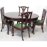 A mahogany wind-out table on cabriole supports to castors,