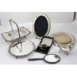 A good collection of silver and plated ware to include an 800 grade silver picture frame of oval