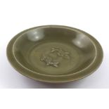 A Southern Song Longquan twin fish dish, diameter 21cm (af).