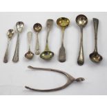 A set of Asprey wishbone sugar nips, London 1901, assorted salt and mustard spoons etc, approx 2.