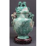 An early-to-mid 20th century jadeite flask vase with cover,