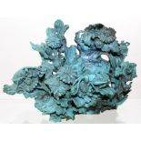 A Chinese finely carved turquoise vase with numerous chrysanthemum blossoms,