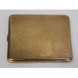 A 9ct gold engine-turned cigarette case, approx 112g.