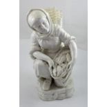 A large blanc de Chine figure of a female kneeling,