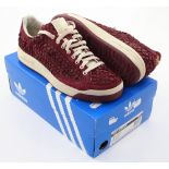 A pair of Adidas Rod Laver NPF and Oki-Ni Un collaboration maroon training shoes with fish skin