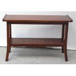 A contemporary mahogany Oriental-style hall table with lower shelf on curved block supports,