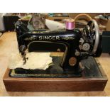 A vintage cased sewing machine.